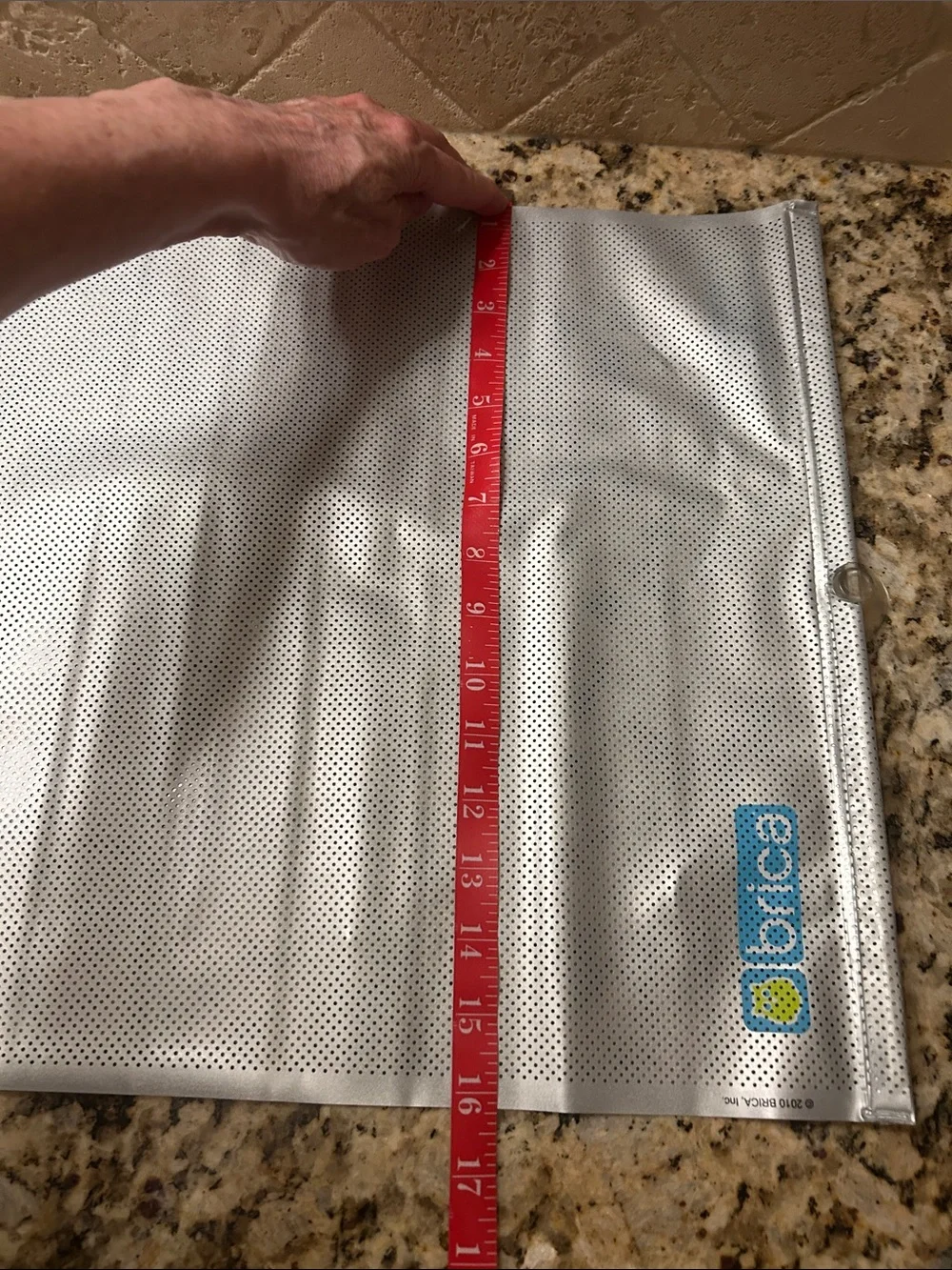 Bric's White Mesh Window Shade with Blue Logo